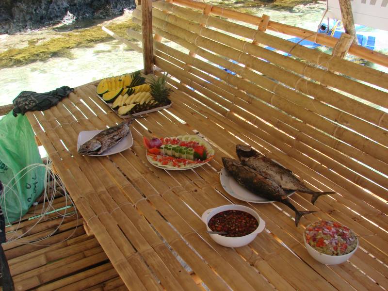 Food in the Philippines - BBQ fish and fresh fruits