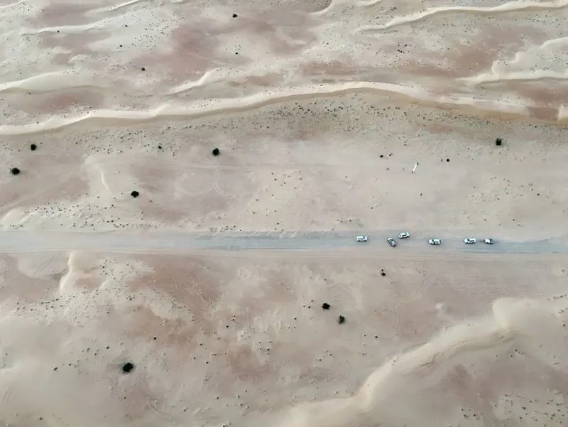 Hot air balloon flight Dubai desert cars from above