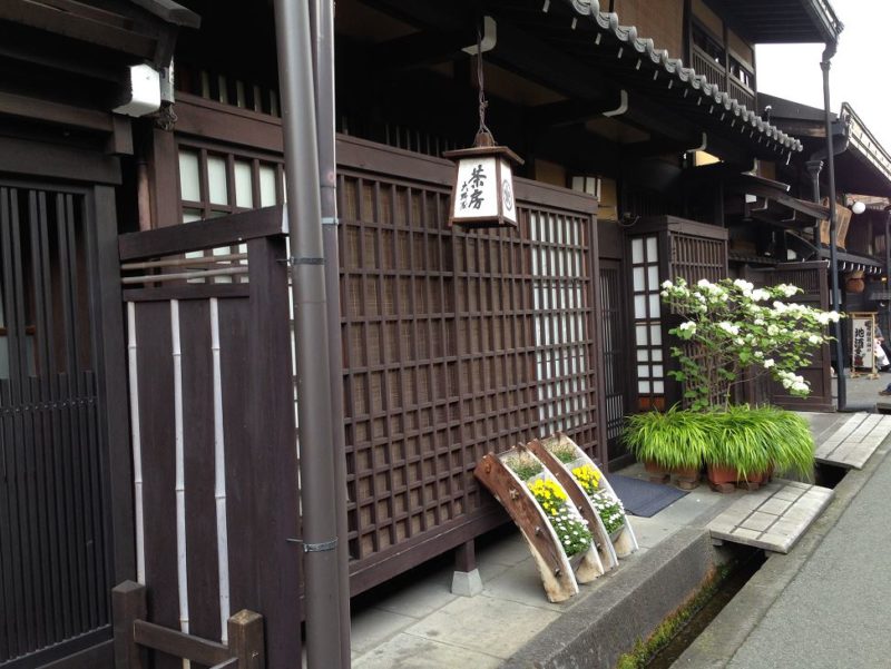 Old shops in Sanmachi Suji historic district in Takayama village Japanese Alps