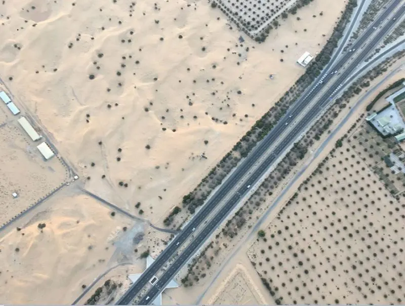 Road through the desert in Dubai