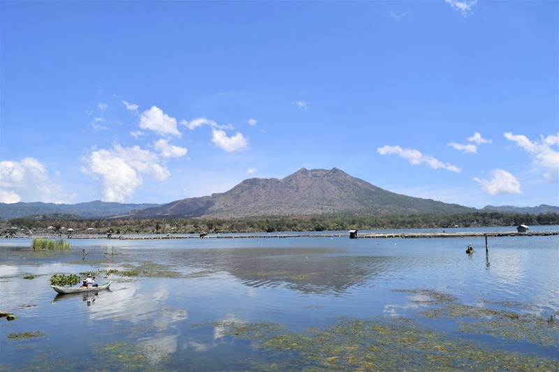 Reflection of Mount Batur in lake