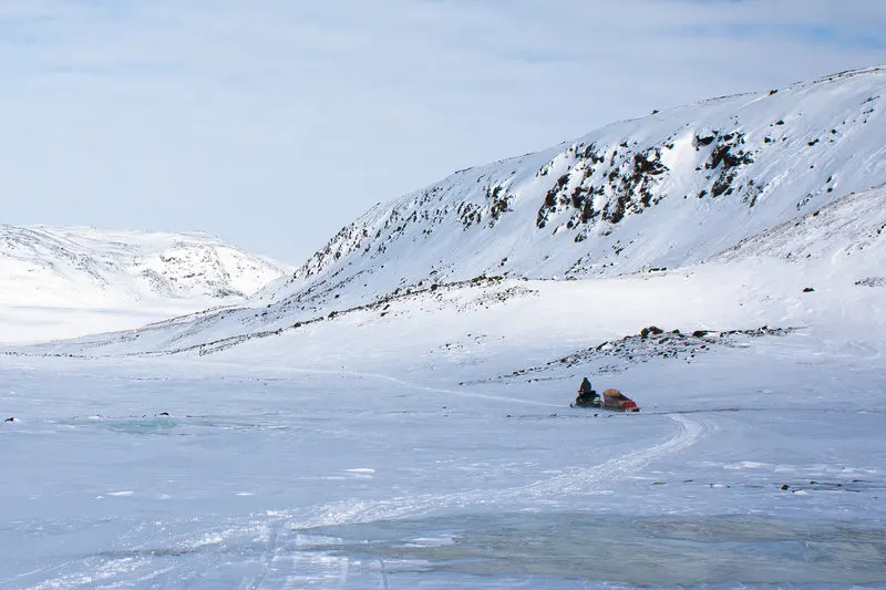 Nunavut snowmobiling on Tundra - photo by Voyageur Tripper